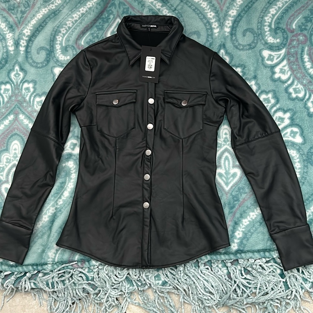 This is an unworn Fashion Nova faux leather top in the size medium.